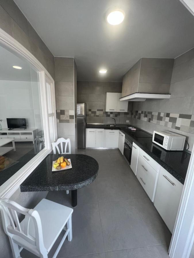 Edificio Playa Chica Apartment เอลเมดาโน ภายนอก รูปภาพ