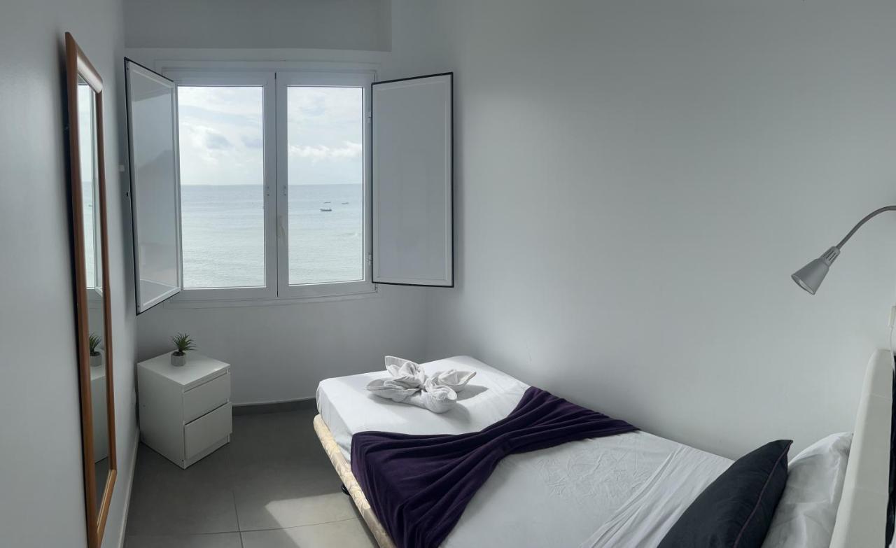 Edificio Playa Chica Apartment เอลเมดาโน ภายนอก รูปภาพ