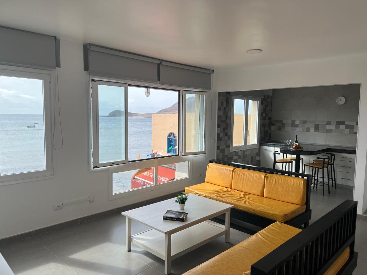 Edificio Playa Chica Apartment เอลเมดาโน ภายนอก รูปภาพ