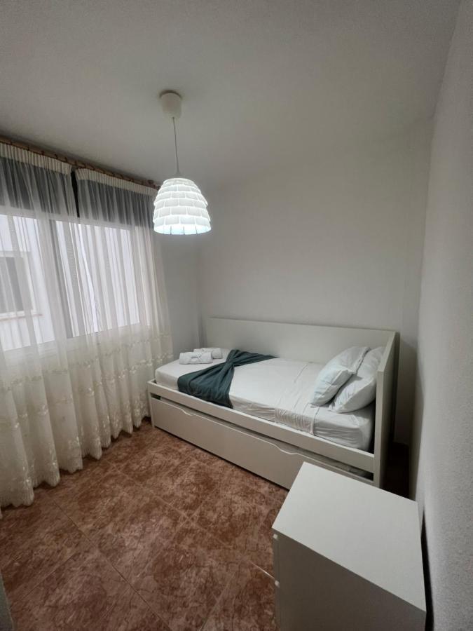 Edificio Playa Chica Apartment เอลเมดาโน ภายนอก รูปภาพ