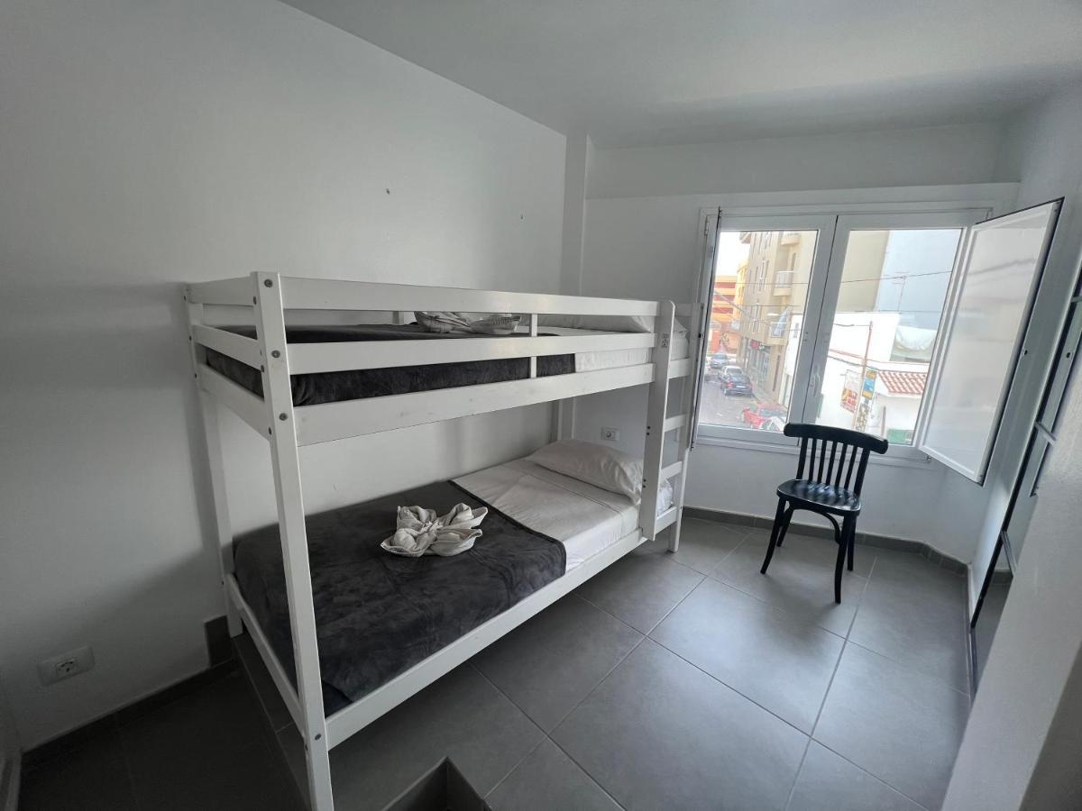 Edificio Playa Chica Apartment เอลเมดาโน ภายนอก รูปภาพ