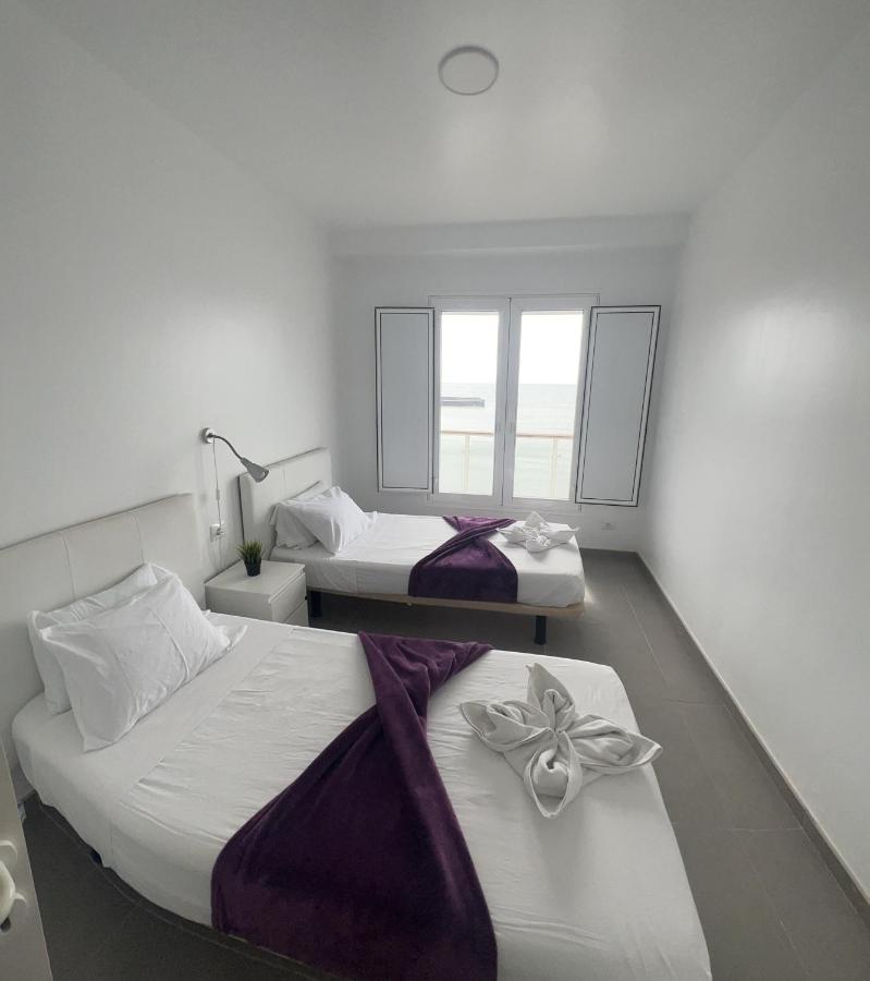 Edificio Playa Chica Apartment เอลเมดาโน ภายนอก รูปภาพ