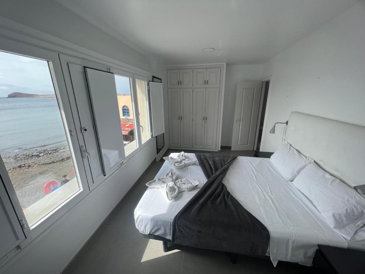 Edificio Playa Chica Apartment เอลเมดาโน ภายนอก รูปภาพ