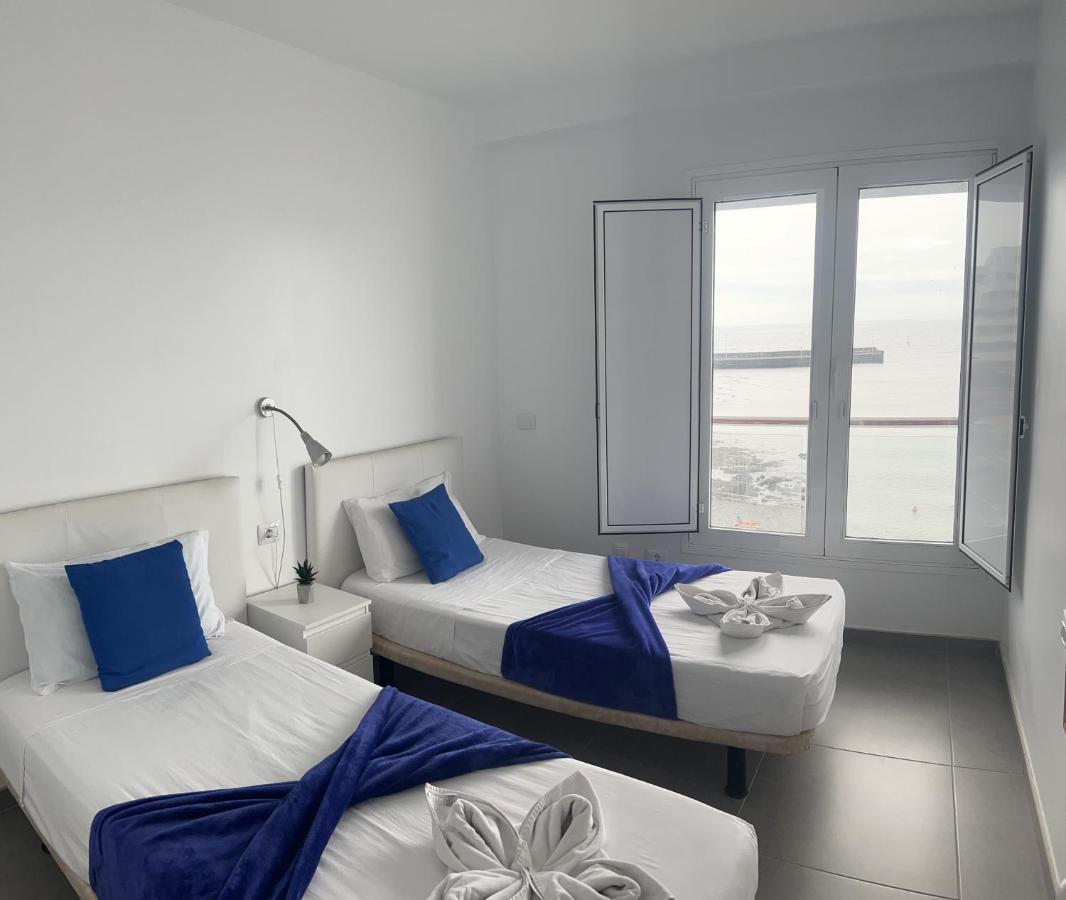 Edificio Playa Chica Apartment เอลเมดาโน ภายนอก รูปภาพ