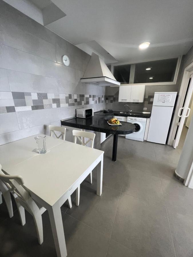 Edificio Playa Chica Apartment เอลเมดาโน ภายนอก รูปภาพ
