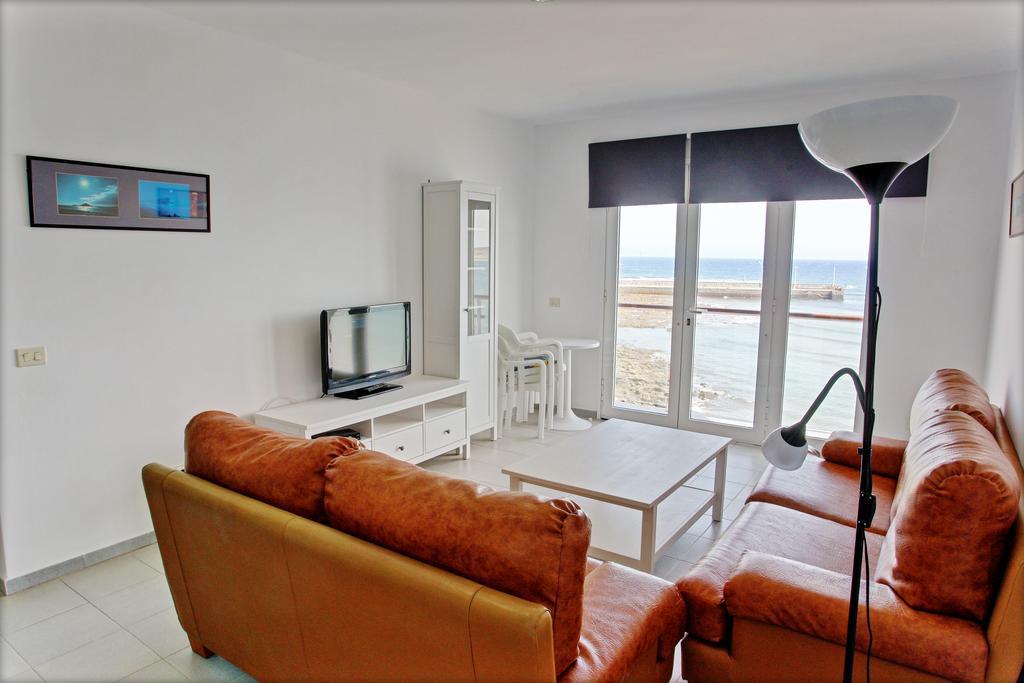 Edificio Playa Chica Apartment เอลเมดาโน ภายนอก รูปภาพ